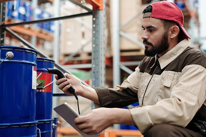 Man using barcode scanner for inventory