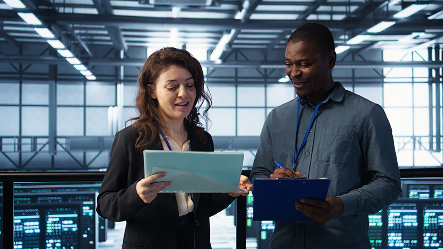 Data center management executives reading files